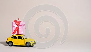 Car with staple gift on neutral background