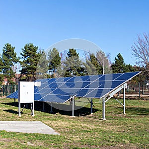 Energy park. Solar panel and eolic system on green park