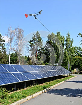 Energy park. Solar panel and eolic system on green park