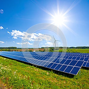 Energy park. Solar panel and eolic system on green park