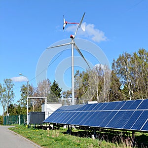 Energy park. Solar panel and eolic system on green park