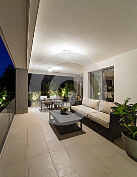 Horizontal view of modern patio at night