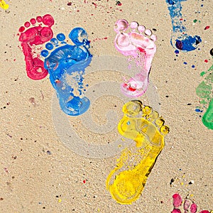 Colorful foot prints in paint