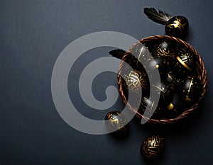 A wicker basket contains eggs painted in shades of white, beige, and blue