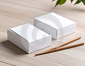 Blank White Takeout Boxes and Chopsticks on Wooden Table