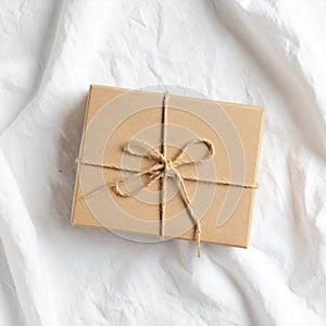Gift Box on White Fabric