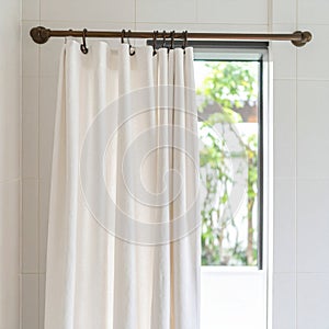 Elegant Bathroom Interior with White Shower Curtain