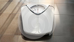 A white analog bathroom scale