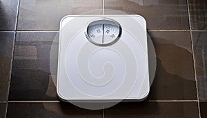 A white analog bathroom scale