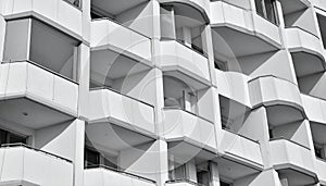 Close-up of Building Facade with Repeating Balcony Patterns