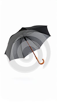 Open umbrella blown by wind gust on white background