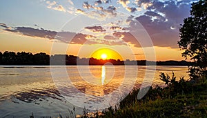 Picturesque view of beautiful sunset on riverside