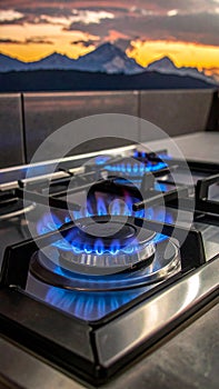 Gas burners with blue flame on modern stove