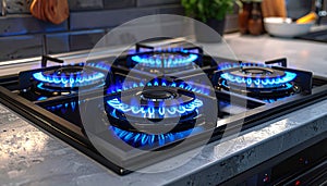 Gas burners with blue flame on modern stove