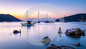 Generated imageSerene coastal scene at sunset.