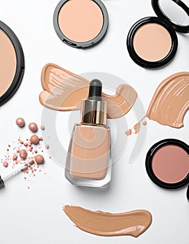 Assorted makeup products on a white background