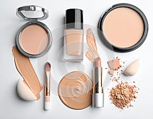 Assorted makeup products on a white background