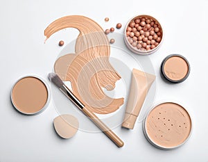 Assorted makeup products on a white background