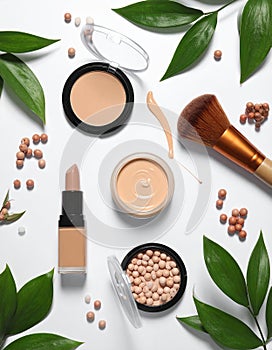 Assorted makeup products on a white background