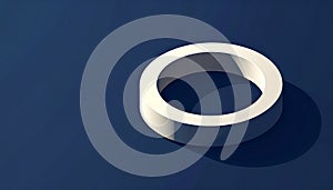 White torus ring on dark blue surface minimalist geometric composition with shadow