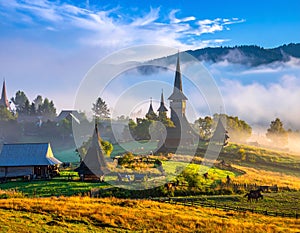 Mist-covered Maramure? landscape in Romania - Generated image