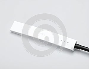 White USB-C Cable on Gray Background