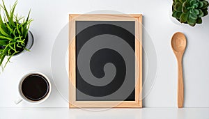 One blank small blackboard on white wall