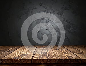Empty wooden table top and colored dark or gray wall background for showing products