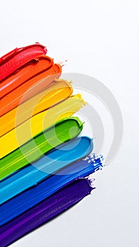 Rainbow paint strokes on a white background