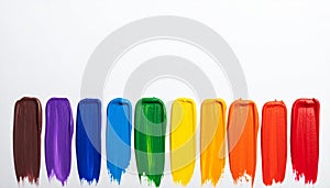 Rainbow paint strokes on a white background