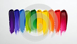 Rainbow paint strokes on a white background