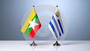 Myanmar and Uruguay flags the relationship with the table, gradient background. Vector