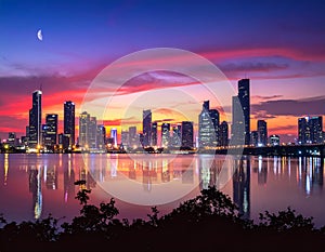 Night City Skyline. Cityscape Background, Beautiful night sky with red sunset over