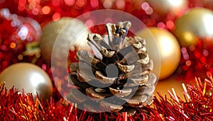 Christmas tree with a pinecone in tinsel