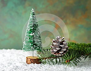 Christmas tree with a pinecone in tinsel