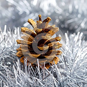 Christmas tree with a pinecone in tinsel