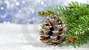Christmas tree with a pinecone in tinsel