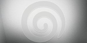 Grainy textured surface forming an abstract background with a vignette