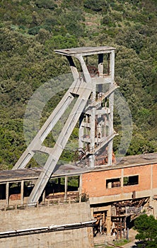 Rusty headframe of an abandoned mine shaft in montevecchio