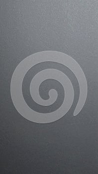 Solid grey background texture with subtle gradient and fine grain for abstract design