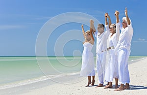 Generations of Family Celebrating on Beach