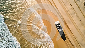 Generative AI Aerial view of a car driving on the beach Bribie Island Queensland Australia Top down perspective bu