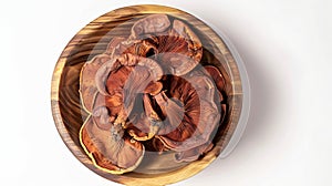Generative AI Dry Ganioderma Lucidum mushroom Ling Zhi Lingzhi Reishi in wooden bowl isolated on white background photo