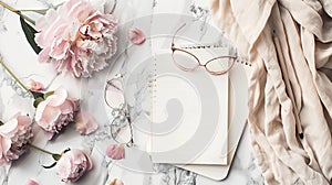 Generative AI Flat lay paper notebook eyeglasses peony flowers and beige cloth on stone background Top view girl h