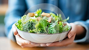 Generative AI Fresh and healthy salad bowl with greens and croutons served on wooden table by hands business conce photo