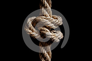 Generative AI Image Of Knot Tied In Length Of Rope Against Black Background Showing Concept Of Strength