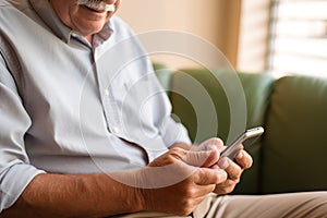 Generative Ai Image Showing Close Up Of Senior Man At Home Using Mobile Phone For Messaging And Browsing