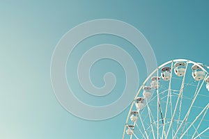 Generative AI Image of White Ferris Wheel with Copy Space on Blue Clear Sky Background