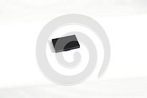 Generative AI sleek black rectangular object isolated on white