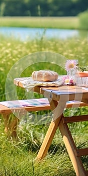 View_on_empty_picnic_table_and_two_chairs_1696417165138_1